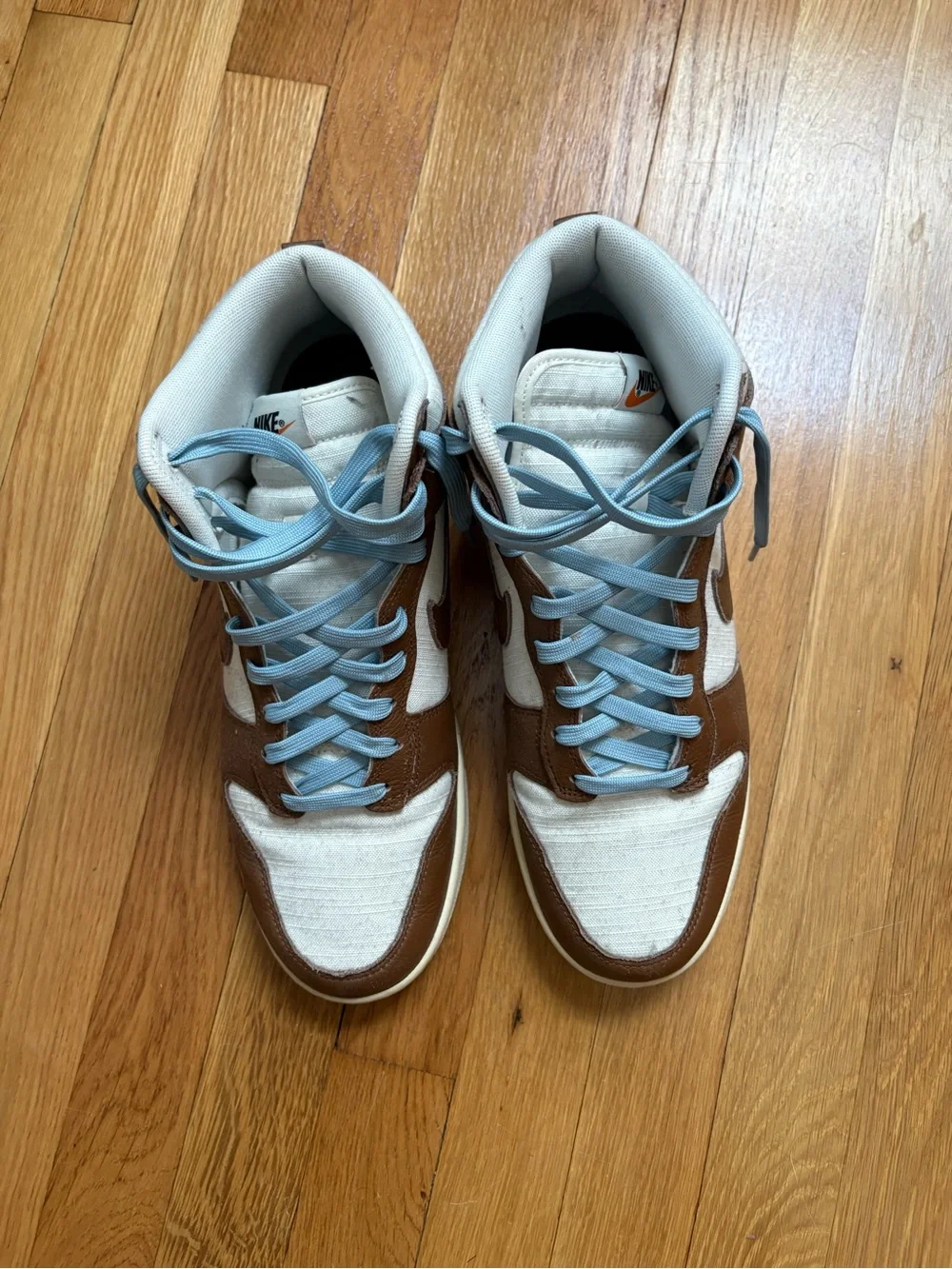 Brown and White High-Top Sneakers with Light Blue Laces